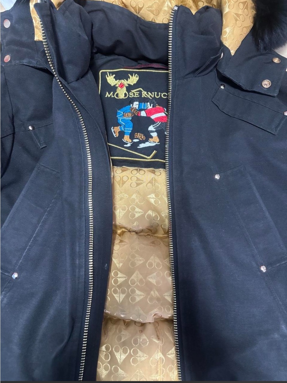 Moose Knuckles Navy Puffer Jacket with Gold Interior